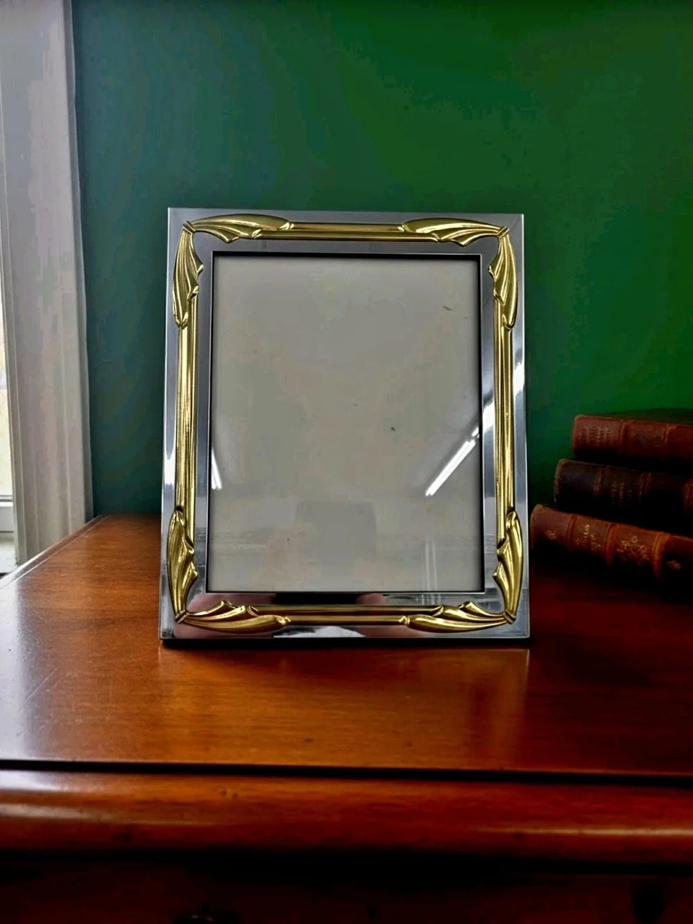 Mid Century Picture Frame Featuring Silver Mirroed Finish With Ornate Gold Tones